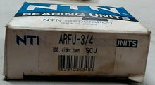 Load image into Gallery viewer, NTN ARFU-3/4 FLANGE BLOCK BEARING 3/4 IN BORE CAST IRON HOUSING *FREE SHIPPING*