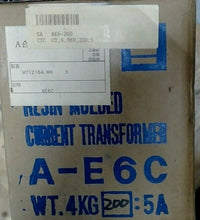 Load image into Gallery viewer, TOSHIBA A-E6C RESIN MOLDED CURRENT TRANSFORMER 200:5A -FREE SHIPPING
