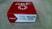 Load image into Gallery viewer, SKF 6200-2RSJEM BALL BEARING UE/01 8/85 -FREE SHIPPING
